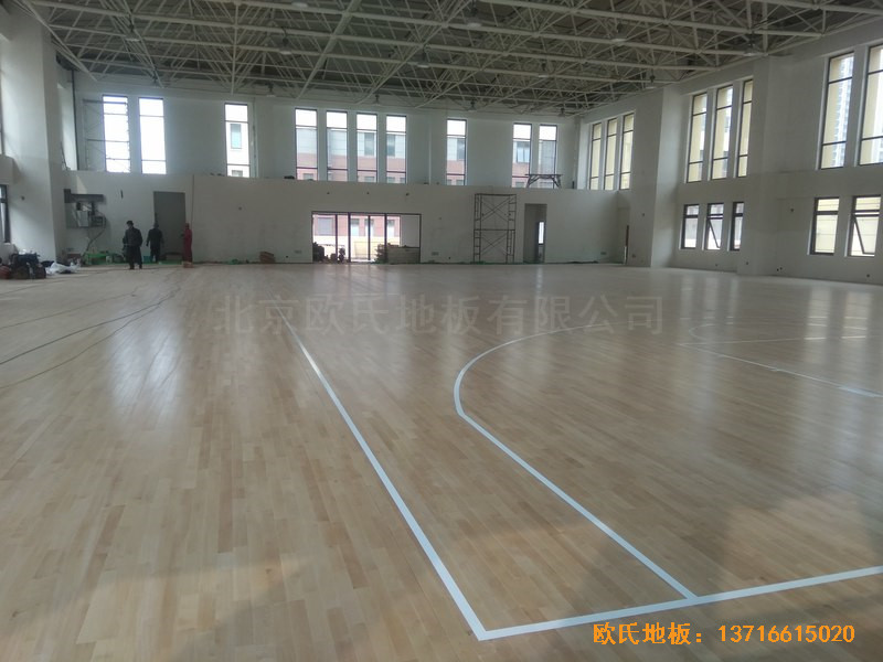 山東濟(jì)南唐冶城籃球館體育木地板安裝案例0
